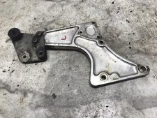 73 Norton Commando 850 left frame foot peg exhaust mount bracket