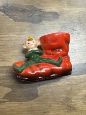 VINTAGE PIXIE ELF SITTING ON A