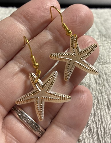 Ivory and gold starfish - and,