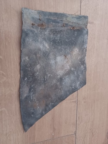 Scrap lead sheet flashing - /,
