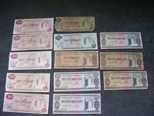 B398 Guyana Banknotes x 13