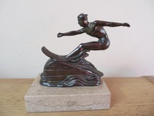 Art Deco spelter figure on marble base styled as a man water-skiing 4" high