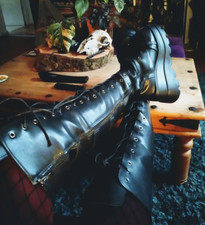 trashed boots. Knee high well