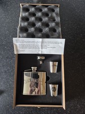 Jack Daniel's branded flask set, presented in a box with a set of instructions.