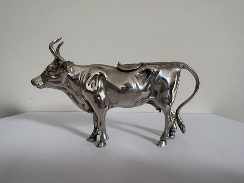 Rare silver cow - a, down)