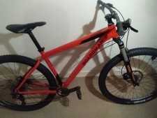 BOARDMAN MHT 8.6 IN GREAT CONDITION IN A LIGHT ORANGE RED METALLIC