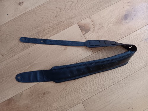 Padded faux leather guitar