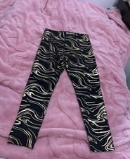 George black and gold sparkly