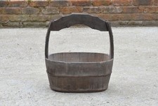 old vintage wooden rice bucket