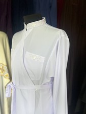White cassock made of wet silk