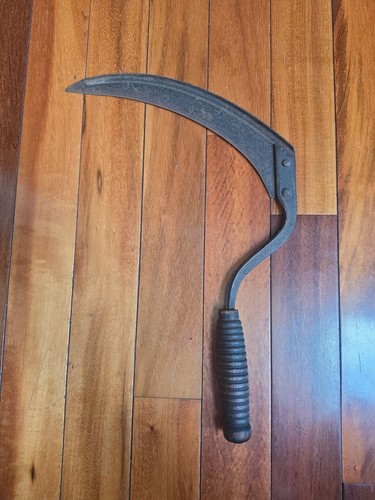 Antique sellers hand scythe - hand,