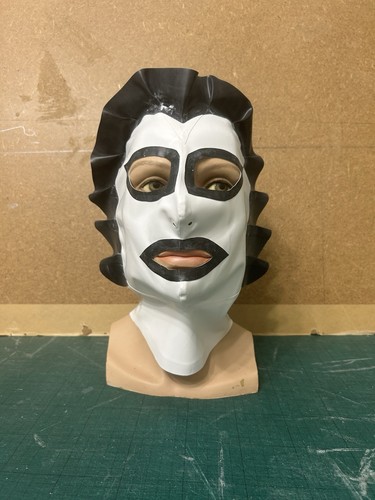 White and black frilled face - and,
