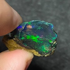 2.0g Natural Ethiopian Opal Rough – Green Orange Red Fire, Dark Crystal Base