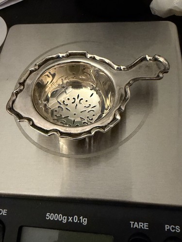 Solid silver tea strainer with - silver,