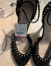 Black heels with gold studs