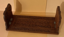 A vintage carved wooden Indian