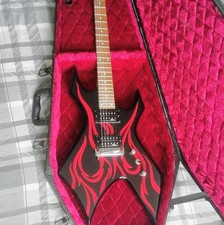 B.C. Rich Warlock Tribal Flame with Coffin Case and Roland Cube Amplifier Used