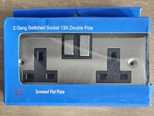 Flat Plate Stainless Steel 2Gang Switched Plug Socket 13A Double Pole Black Trim