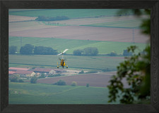 Yellow Autogyro Flying Over
