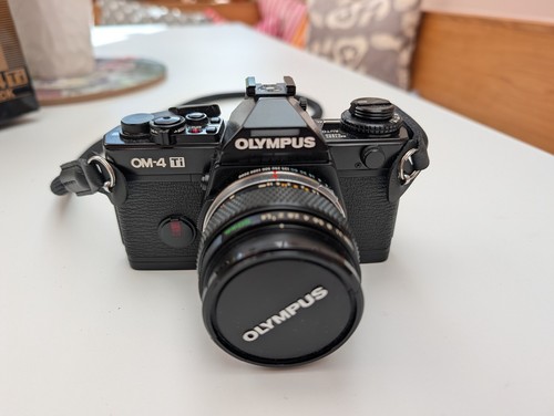 Olympus black near - ti,