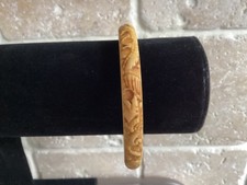 vintage carved plastic bakelite bracelet