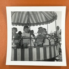 Children on merry-go-round