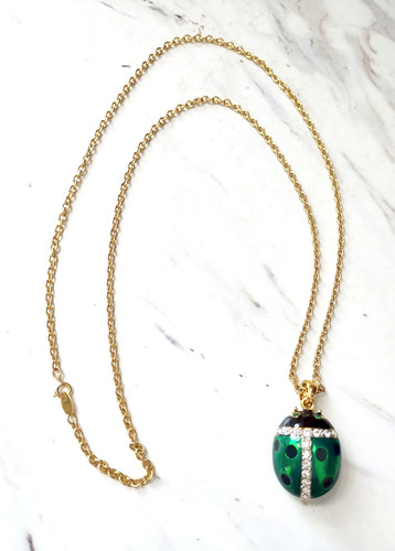 Avon green enameled ladybug