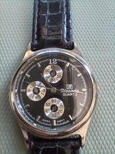 Ricardo watch with black strap and face, new battery