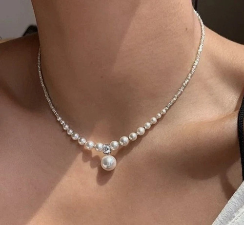 White pearl necklace with - necklace,