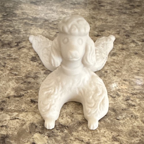 White porcelain poodle dog - poodle,