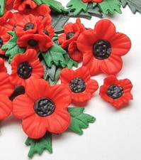 Poppy charms and glue on