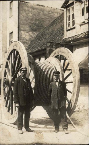 Men giant wooden - spool, rope