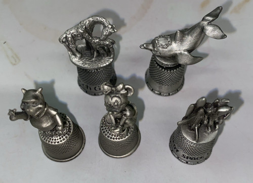 Disney pewter thimbles - x,