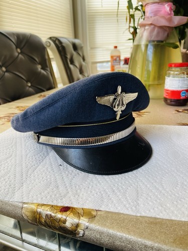 Blue airline pilot hat with - airline,