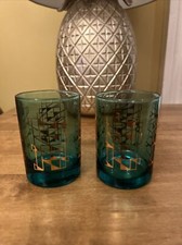 PAIR OF VINTAGE GREEN AND GOLD DRINKING GLASSES IN GOOD CONDITION
