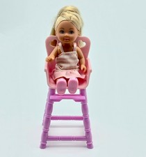 Doll and Pink Highchair Steffi