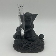 Past Times Fairy Sitting Beside a Flower Resin Sculpture