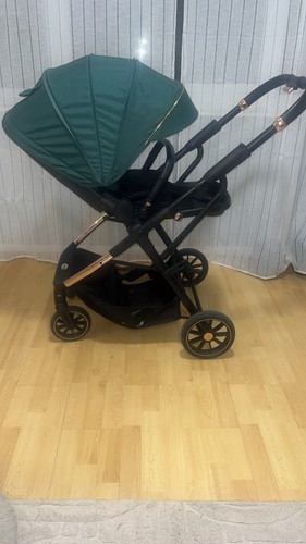 Green lejoux baby pushchair