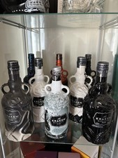 Set Of 8 Different Kraken Rum Limited Edition Bottles.