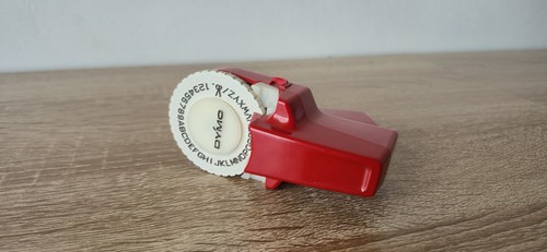Vintage red dymo handheld - red,