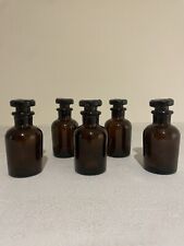 Brown apothecary bottles with