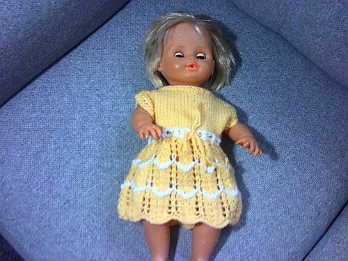 Hand knitted doll dress fits