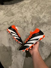 Orange and black adidas