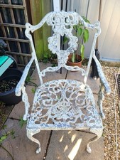 A pair of vintage white aluminium arm chairs for outside/inside use 40+years old