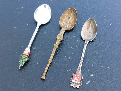 Three ornate teaspoons - three,