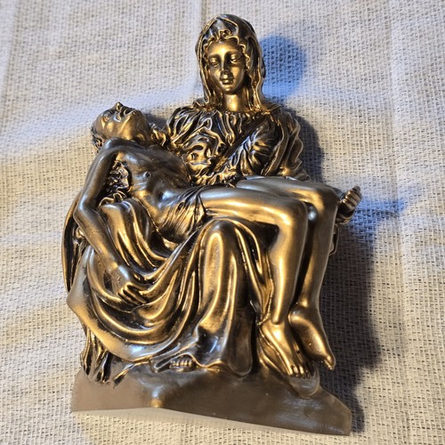 Lifesymbols pieta statue hand - lifesymbols,
