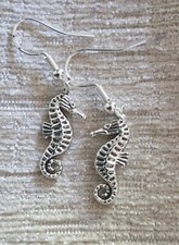 Tibetan silver seahorse charm drop earrings on stamped 925 silver fish hooks