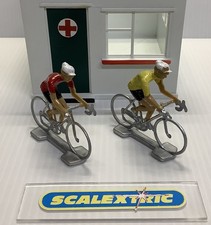 A.. 2 x CYCLISTS (Red & Yellow