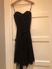A black evening dress, Debut, knee length