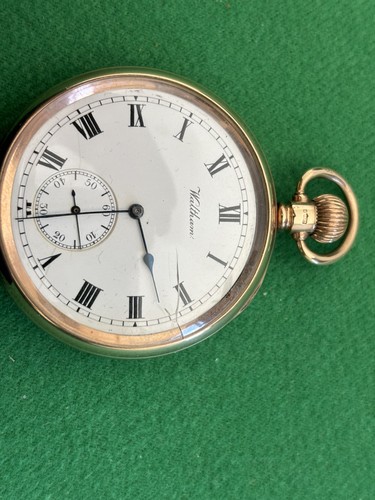 Solid gold open face - open,